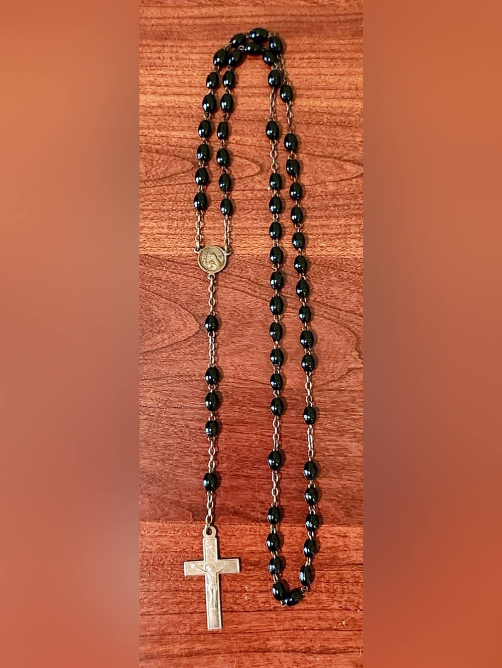 Vintage Black Oval Bead Rosary Female Saint Kneeling before the Eucharist